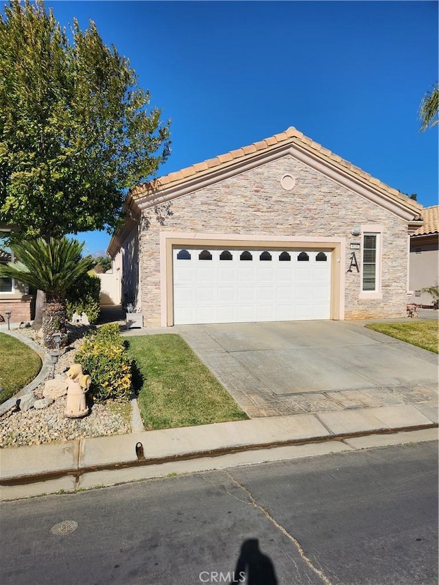 single story home featuring a garage