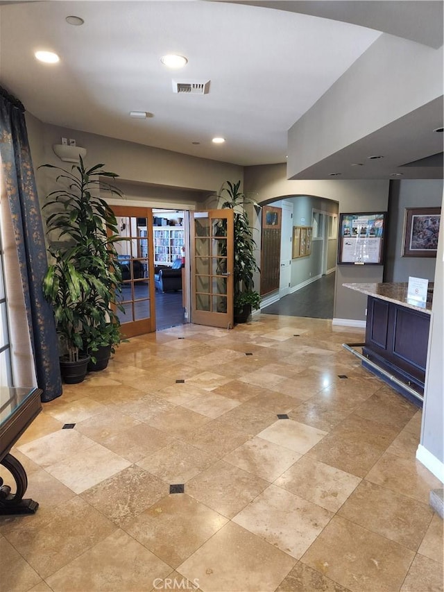 hallway featuring french doors