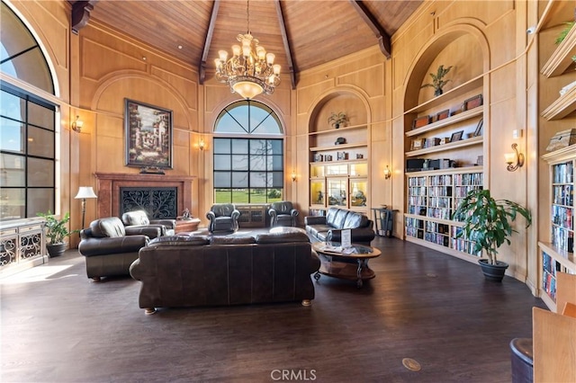 living room with wood ceiling, beamed ceiling, high vaulted ceiling, dark hardwood / wood-style floors, and built in features