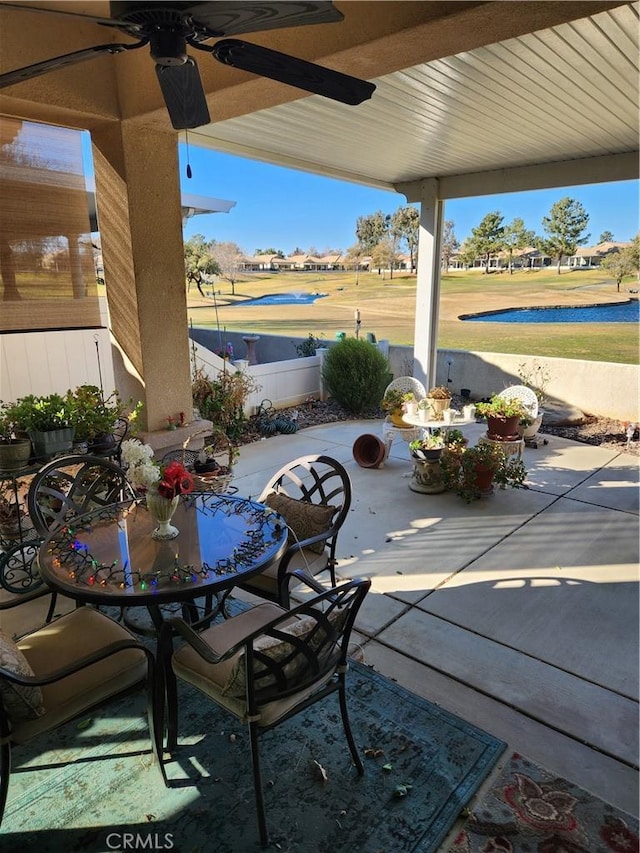 view of patio featuring ceiling fan