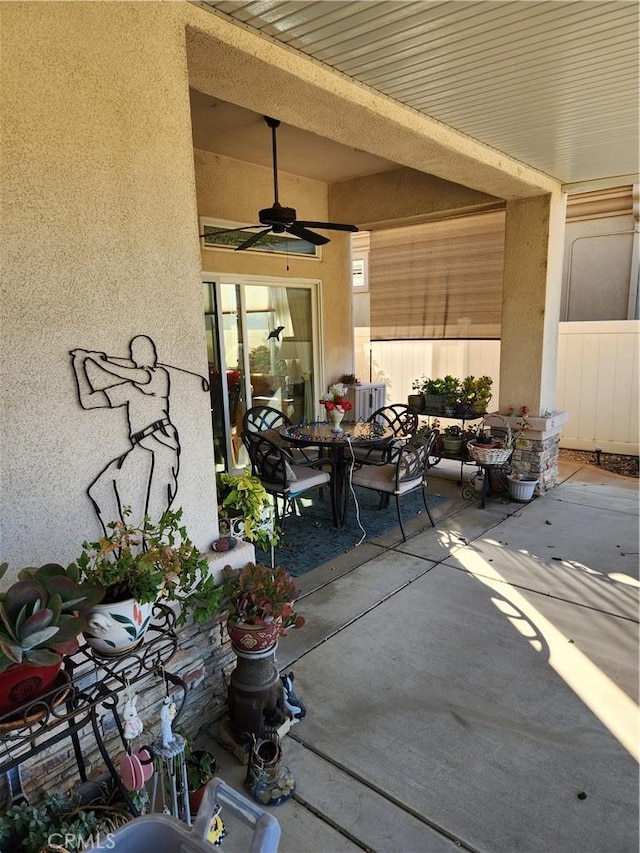 view of patio with ceiling fan