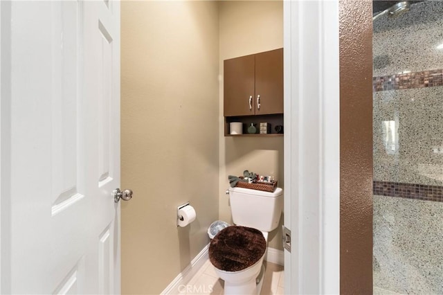 bathroom with toilet and a shower