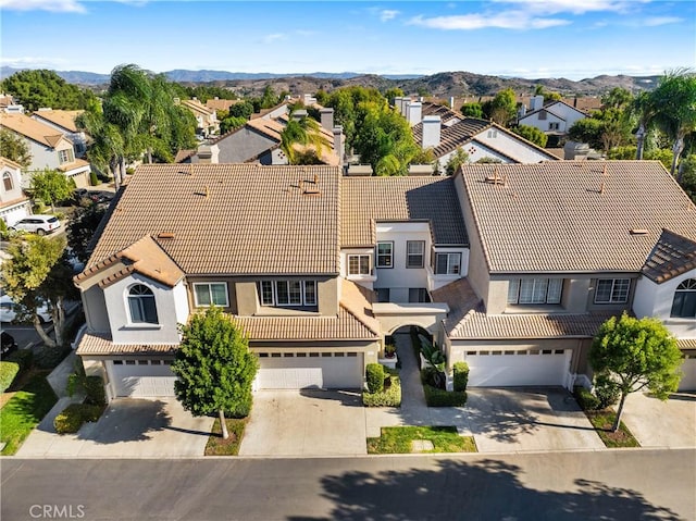 bird's eye view with a mountain view