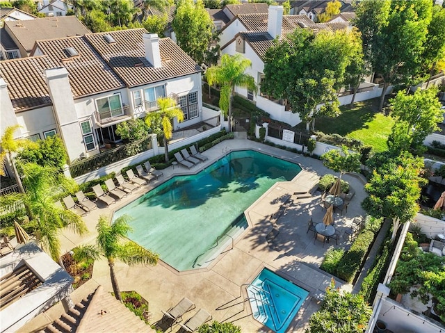 view of swimming pool with a patio area