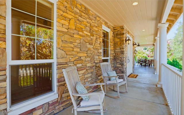 view of patio featuring a porch