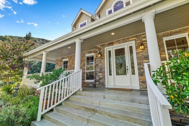 property entrance with a porch