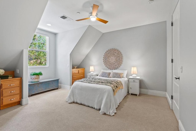 carpeted bedroom featuring lofted ceiling and ceiling fan