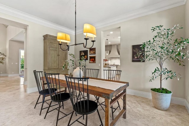 dining space with ornamental molding