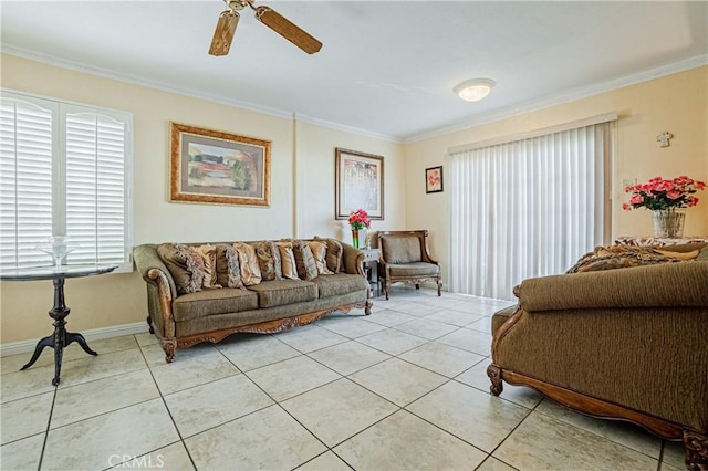 living room featuring ceiling fan, ornamental molding, and light tile patterned floors