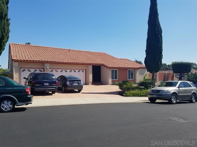 view of front of property featuring a garage