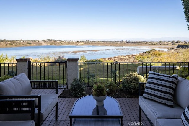 deck featuring a water view