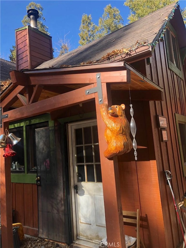 exterior space featuring a chimney