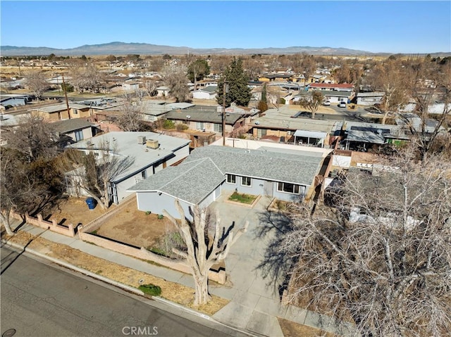 drone / aerial view featuring a mountain view