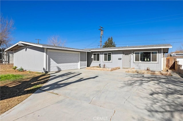 single story home featuring a garage