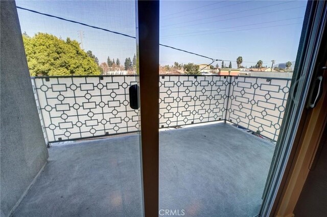 view of patio with a balcony