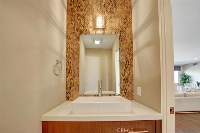 bathroom featuring vanity and visible vents