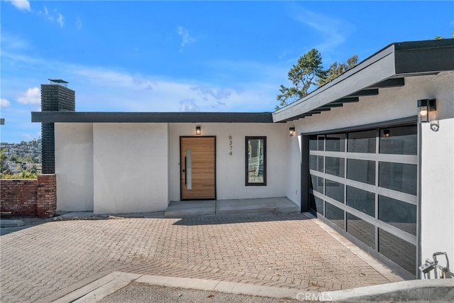 entrance to property with a garage