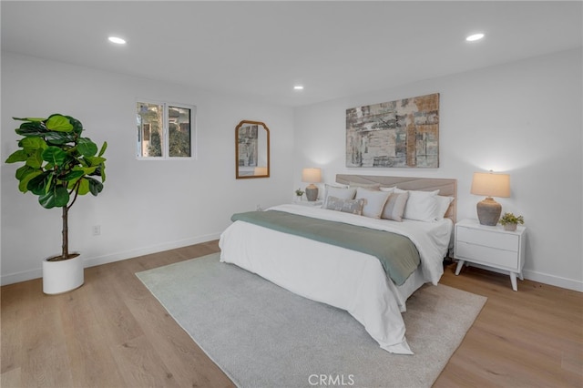 bedroom with light hardwood / wood-style floors