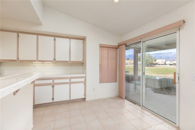 interior space with vaulted ceiling