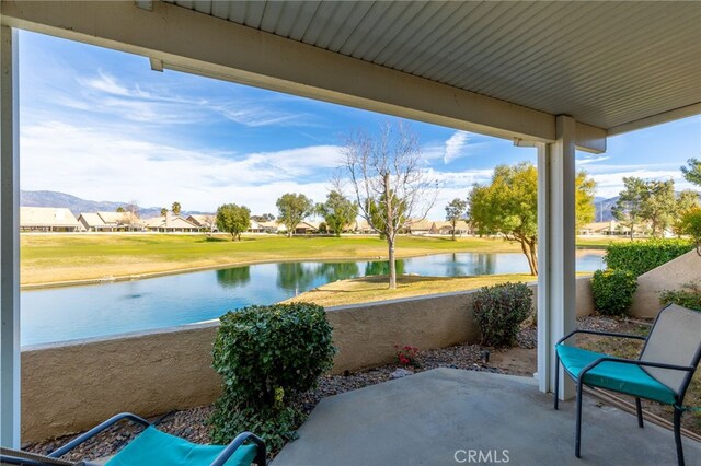 view of patio featuring a water view