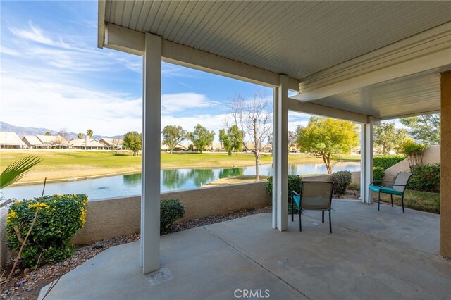 view of patio / terrace featuring a water view