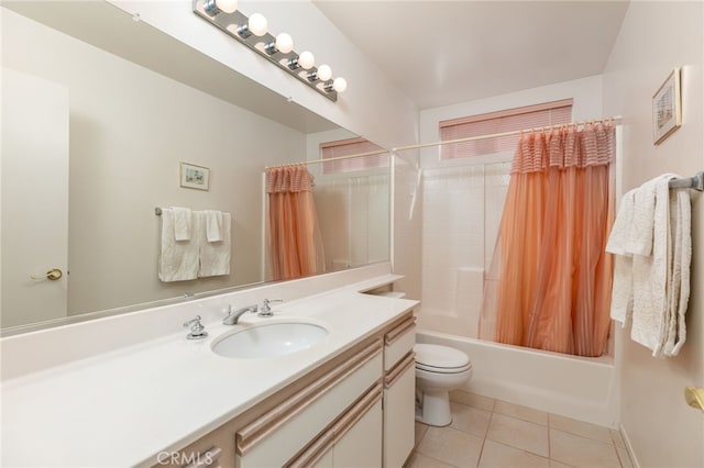 full bathroom with tile patterned flooring, shower / bath combo, vanity, and toilet