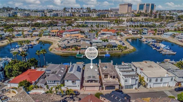 drone / aerial view featuring a water view