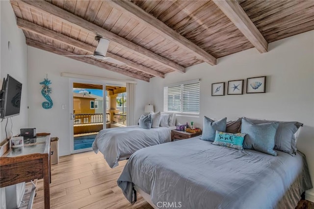 bedroom featuring beamed ceiling, light wood-type flooring, access to exterior, and wood ceiling