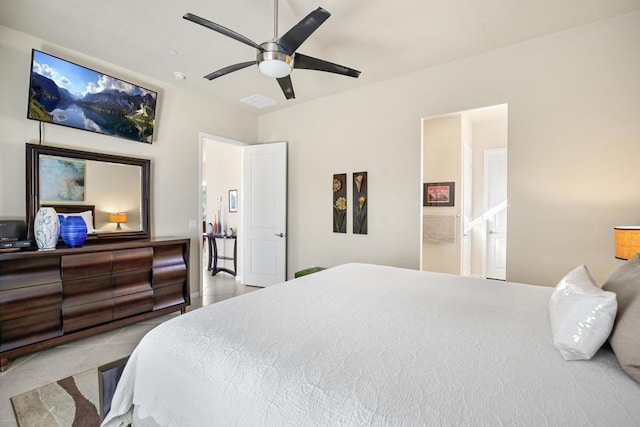 bedroom featuring ensuite bathroom and ceiling fan