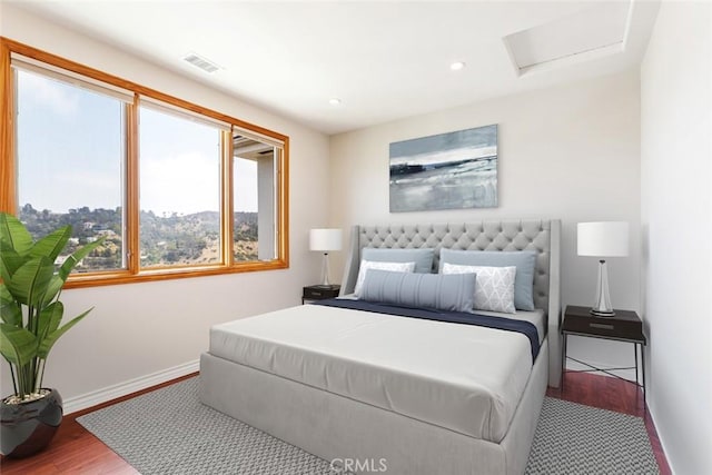 bedroom featuring wood-type flooring