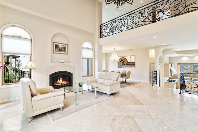 living room with a towering ceiling