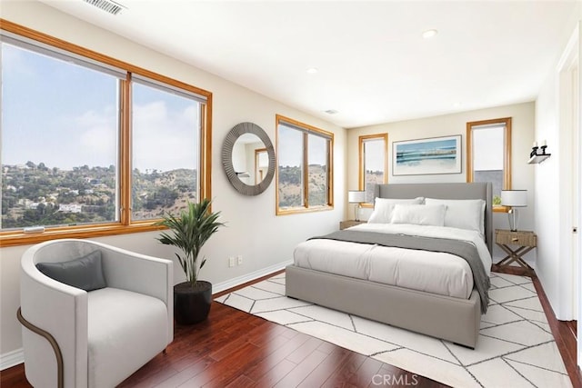 bedroom with light wood-type flooring