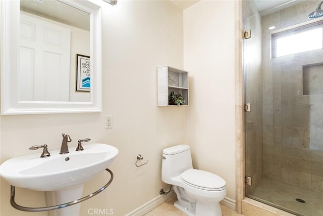 bathroom with toilet, a shower with door, tile patterned floors, and sink