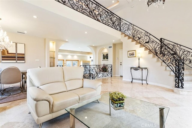 living room with an inviting chandelier