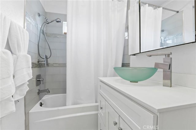 bathroom with vanity and shower / bathtub combination with curtain