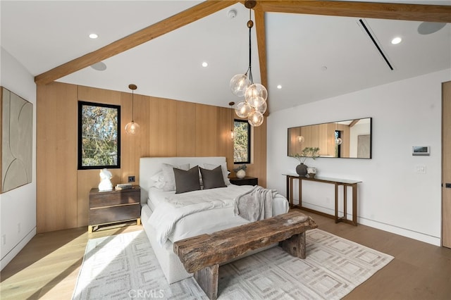 bedroom with beamed ceiling, recessed lighting, wood finished floors, wood walls, and high vaulted ceiling