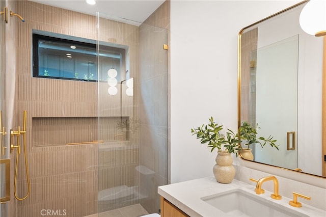 full bath featuring a shower stall, vanity, and toilet