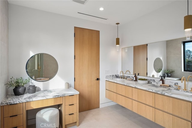 full bath with tile patterned floors, double vanity, visible vents, and a sink