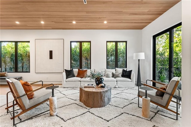 living room with recessed lighting and wood ceiling
