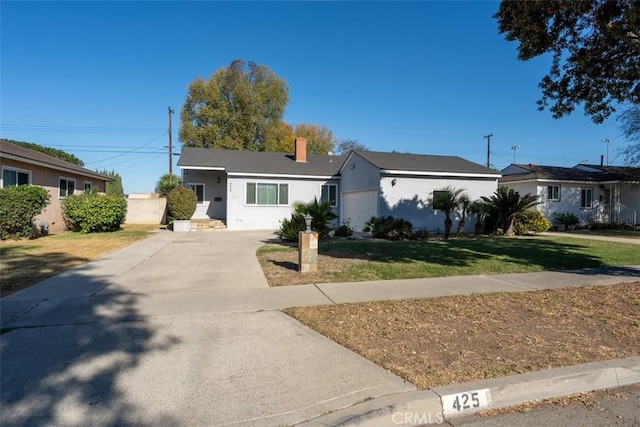 single story home with a front lawn