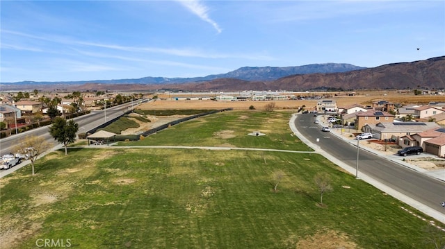 drone / aerial view featuring a mountain view