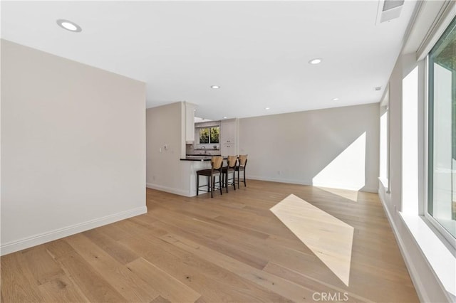 interior space with light hardwood / wood-style floors