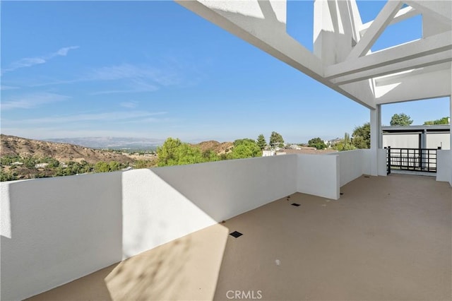 view of patio / terrace with a balcony