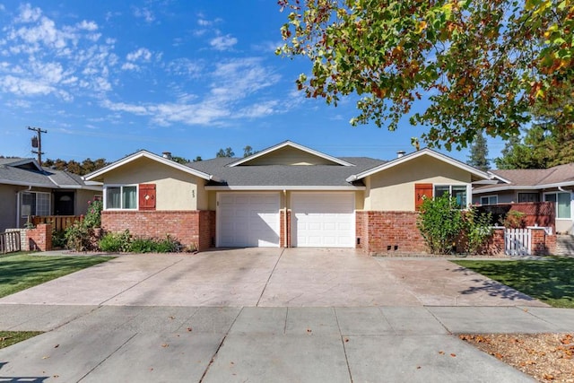 ranch-style home featuring a garage