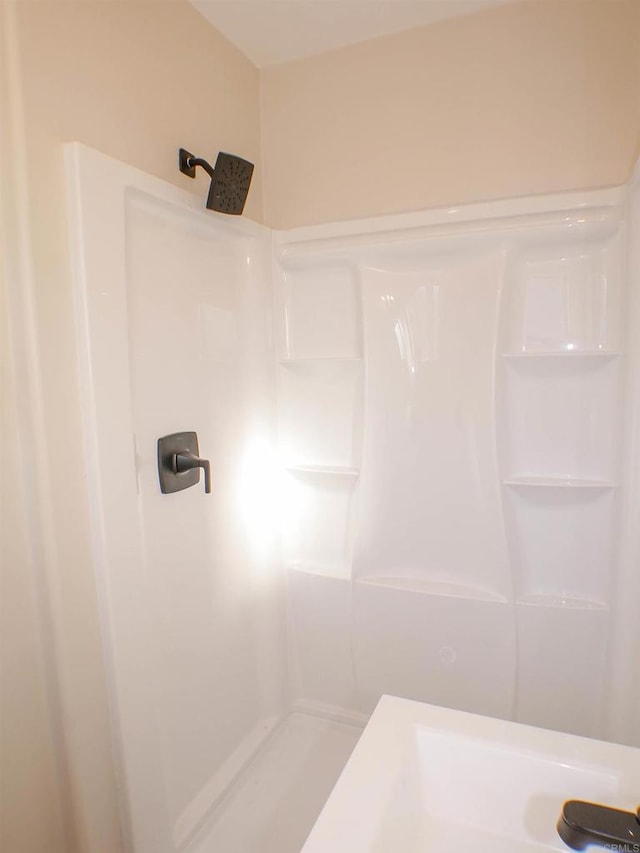 bathroom featuring a shower