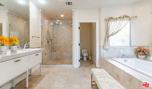 full bathroom featuring vanity, plus walk in shower, and toilet