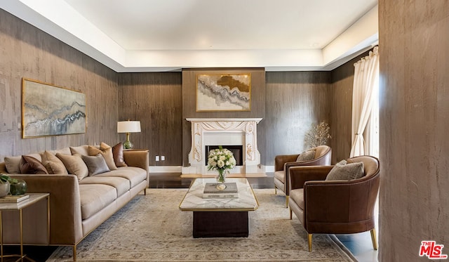 sitting room with wood walls