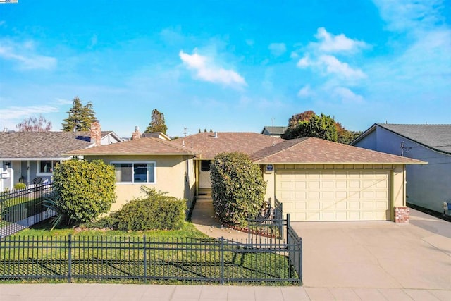 ranch-style house featuring a front lawn and a garage