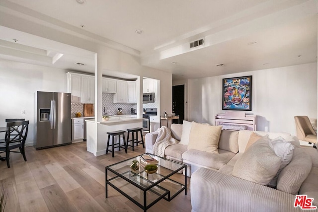 living room with light wood-type flooring