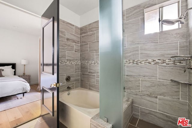 bathroom with hardwood / wood-style flooring